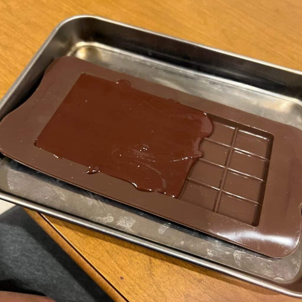 How to pour melted chocolate in a bowl.